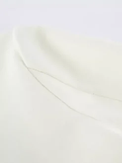 Blazer crème à revers cranté pour femme - Veste oversize à simple boutonnage - Tenue printanière décontractée et minimaliste idéale pour la ville (collection printemps 2026)