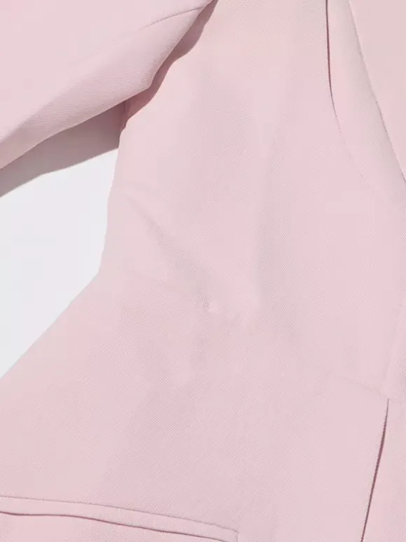 Blazer chic à manches longues découpées pour femme
