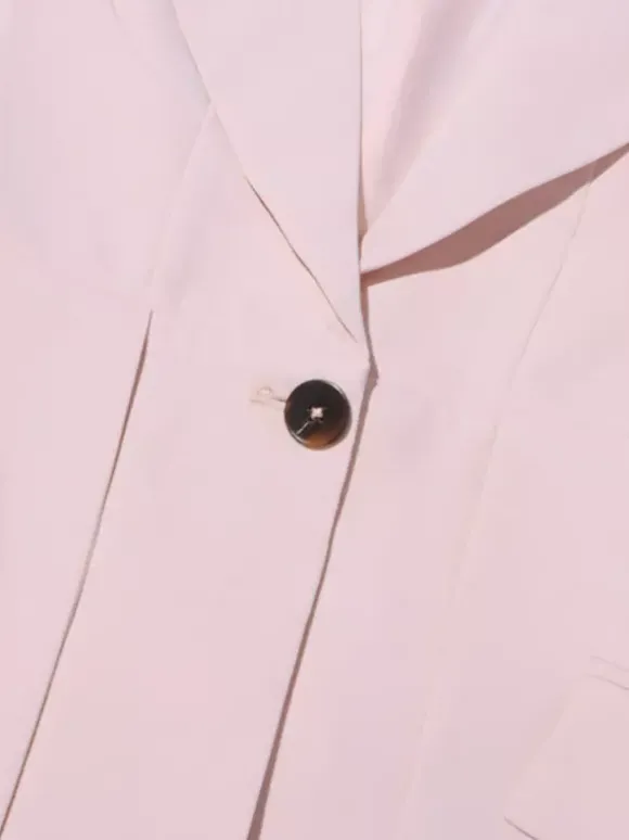 Blazer chic à manches longues découpées pour femme
