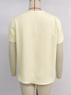 Blouse pour femme abricot col en V manches courtes style décontracté idéale pour l'été