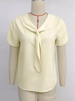 Blouse pour femme abricot col en V manches courtes style décontracté idéale pour l'été