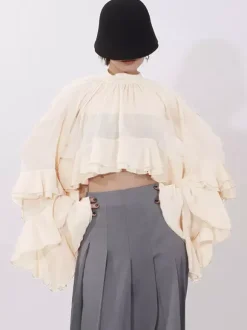 Blouse pour femme couleur saumon à volants plissée col montant manches longues chic