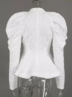 Blouse texturée en jacquard à manches bouffantes col montant taille péplum ourlet évasé