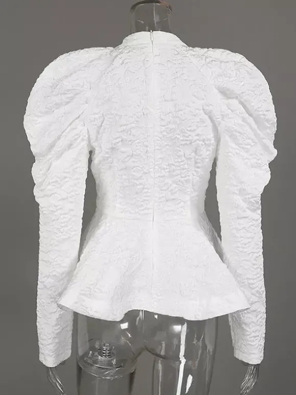 Blouse texturée en jacquard à manches bouffantes col montant taille péplum ourlet évasé