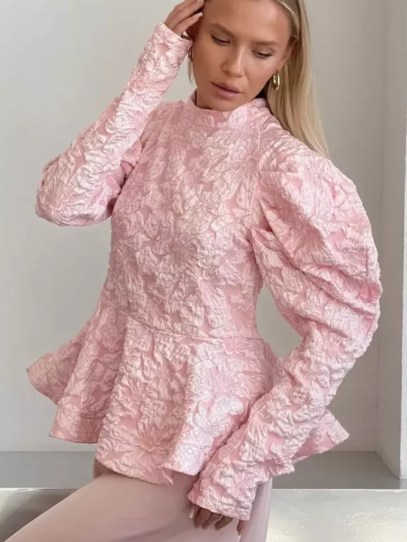 Blouse texturée en jacquard à manches bouffantes col montant taille péplum ourlet évasé
