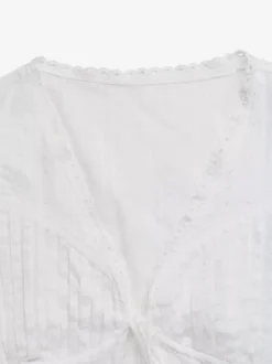 Blouse blanche à lacets et col en V pour femme sans manches sexy