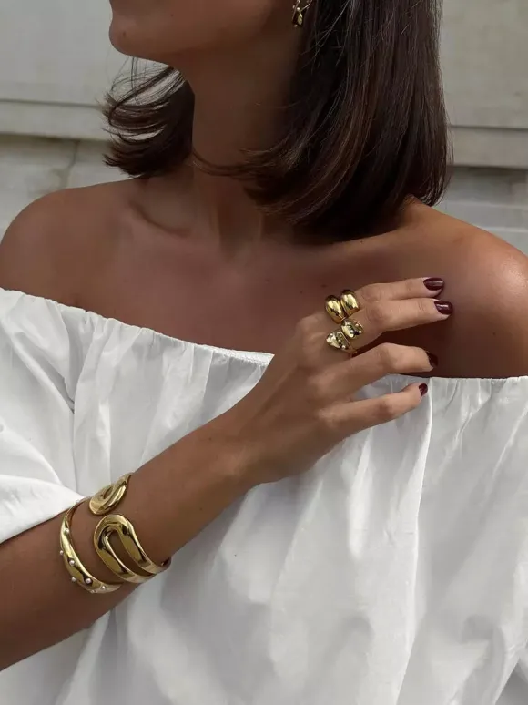 Blouse blanche élégante à épaules dénudées et manches longues en coton pour femme