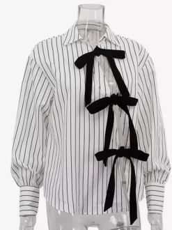 Blouse blanche pour femme col rabattu manches longues style décontracté avec n艙uds.