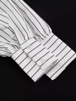 Blouse blanche pour femme col rabattu manches longues style décontracté avec n艙uds.