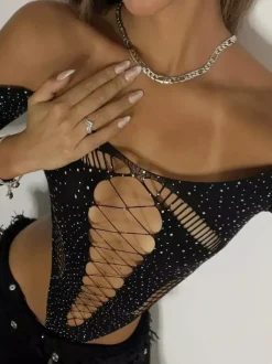Body transparent à manches longues en dentelle jaune transparente orné de strass et de résille contrastante.