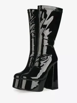Bottes Gogo jaunes à plateforme et talon compensé en cuir verni brillant.