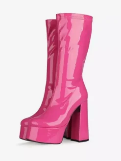 Bottes Gogo jaunes à plateforme et talon compensé en cuir verni brillant.