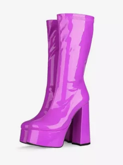 Bottes Gogo jaunes à plateforme et talon compensé en cuir verni brillant.