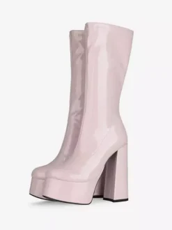 Bottes Gogo jaunes à plateforme et talon compensé en cuir verni brillant.