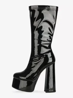 Bottes Gogo jaunes à plateforme et talon compensé en cuir verni brillant.