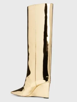 Bottes hautes dorées à bout pointu et talons compensés