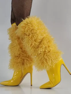 Bottes jaunes hautes en fausse fourrure à bout pointu et talons hauts