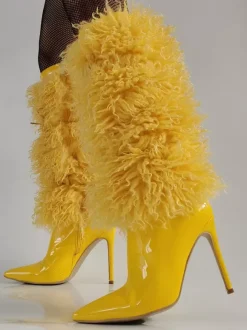 Bottes jaunes hautes en fausse fourrure à bout pointu et talons hauts
