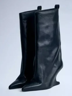 Bottes mi-mollet en daim à bout pointu et talon compensé