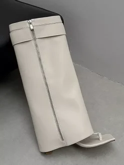 Bottes noires à talons hauts et boucle pour femme