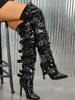 Bottes noires au-dessus du genou bout pointu boucles talon haut cuissardes