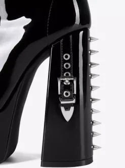 Bottes noires hautes à plateforme et boucle lacets et talons épais