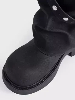 Bottes noires mi-mollet pour femmes bout rond détail boucle