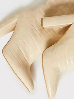 Bottes cuissardes larges pour femmes à talon épais et à motif pierre style oversize
