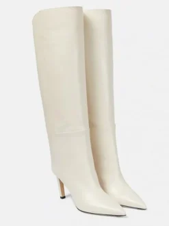 Bottes hautes blanches à bout pointu et talons hauts  bottes larges aux mollets