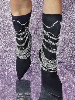 Bottes mi-mollet en daim à bout pointu et talon aiguille avec détail en métal