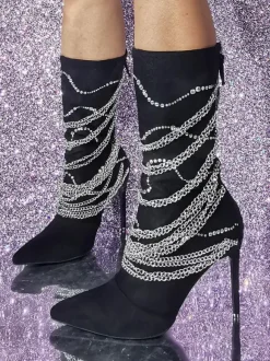 Bottes mi-mollet en daim à bout pointu et talon aiguille avec détail en métal