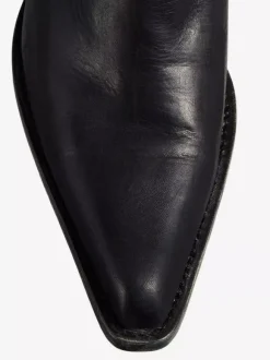 Bottes plates noires à bout pointu et froncées mi-mollet