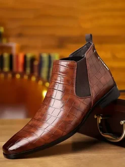 Bottines Chelsea noires à bout rond pour homme motif pierre
