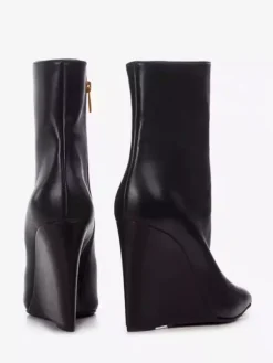 Bottines compensées noires à bout pointu et fermeture éclair pour femmes