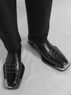 Bottines noires à bout carré et talon compensé clouté pour hommes