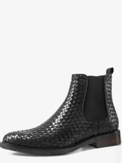 Bottines Chelsea noires pour homme bout rond à enfiler.