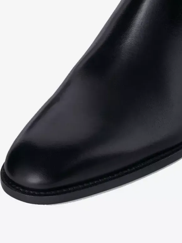 Bottines Chelsea pour homme en cuir véritable bout rond à enfiler et talon épais.