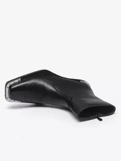 Bottines noires à bout carré et talon épais ornées de détails métalliques