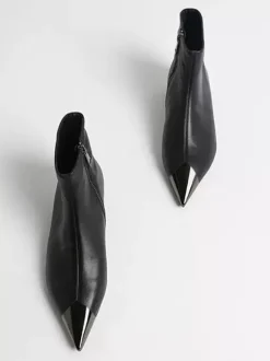Bottines noires à bout pointu et plates pour femmes 2026