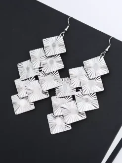 Boucles d'oreilles argentées pour adulte style western décontracté bijoux à motifs.