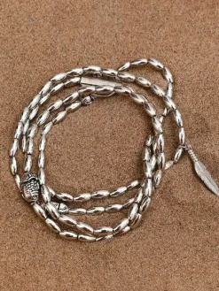 Bracelet de cheville plaqué avec pendentif plume d'inspiration bohème