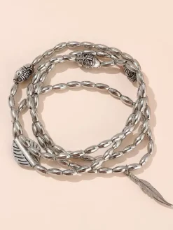 Bracelet de cheville plaqué avec pendentif plume d'inspiration bohème