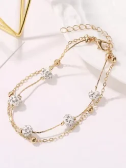 Bracelet de cheville en perles de cristal et base en métal