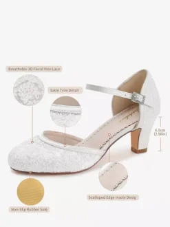 Chaussures de mariage vintage ivoire à bout rond et talon compensé.