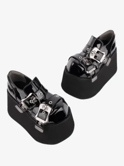 Chaussures Lolita gothiques 艗illets noirs Escarpins Lolita à talons compensés en cuir PU