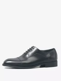 Chaussures Oxford noires à bout rapporté pour hommes en cuir véritable à lacets.
