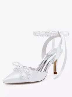 Chaussures de mariage ivoire en satin à bout pointu avec perles et n艙ud à talons hauts