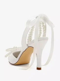 Chaussures de mariage ivoire en satin à bout pointu avec perles et n艙ud à talons hauts