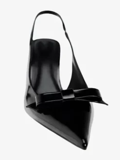 Chaussures habillées noires à talons hauts avec n艙uds et bride arrière à talons aiguilles