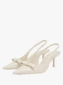 Chaussures habillées noires à talons hauts avec n艙uds et bride arrière à talons aiguilles